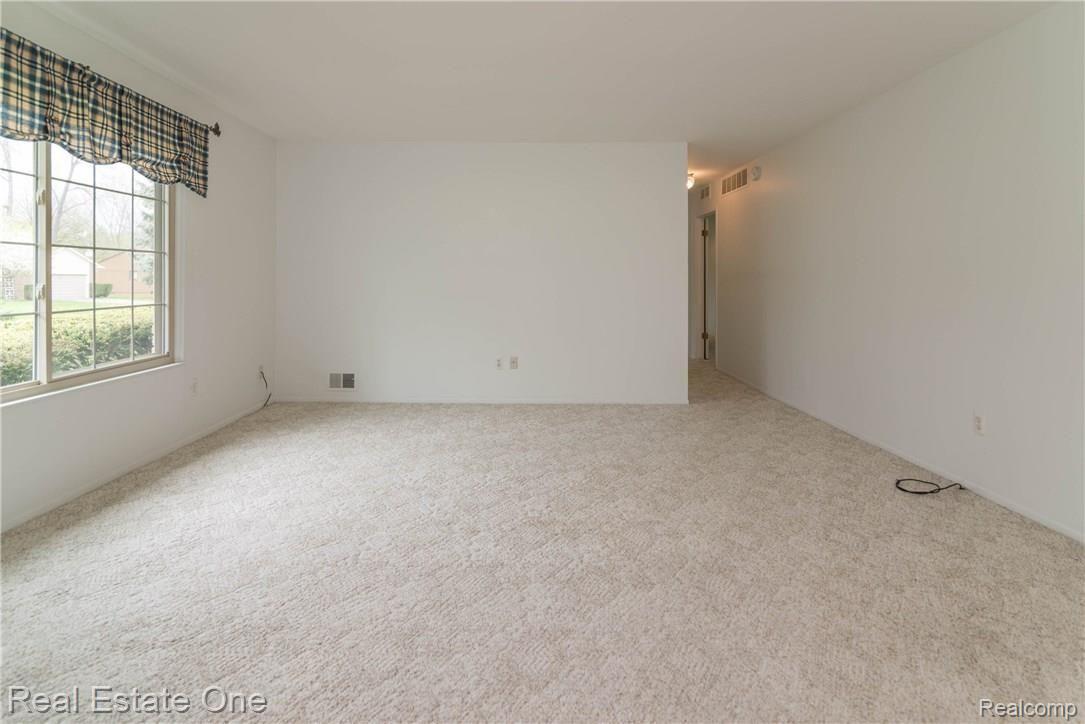 612 Ridge Road Walled Lake, MI 48390 - Photo 7 of 25 Large picture window in living room