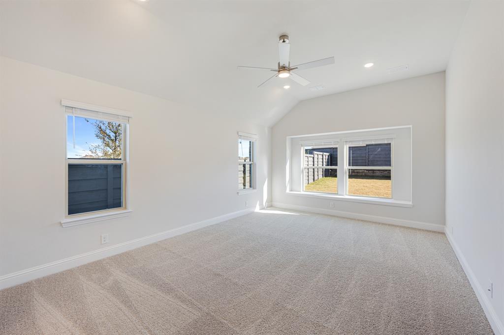 7316 Iris Road Aubrey, TX 76227 - Photo 17 of 40 a view of an empty room with a window