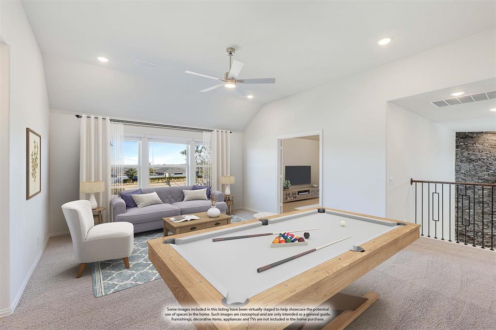 7316 Iris Road Aubrey, TX 76227 - Photo 25 of 40 a living room with furniture and a flat screen tv