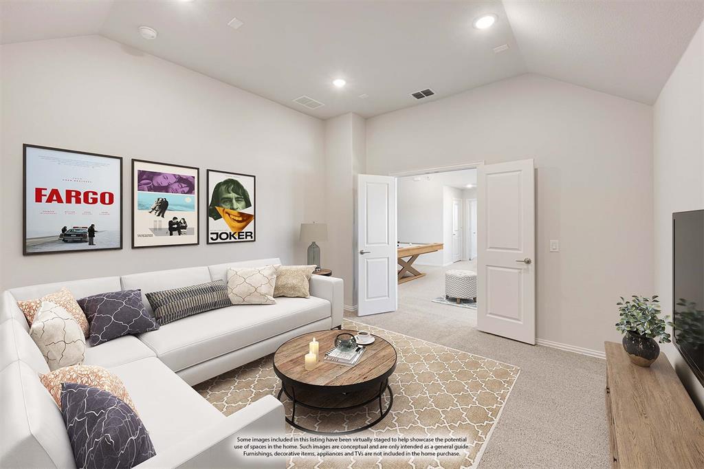 7316 Iris Road Aubrey, TX 76227 - Photo 29 of 40 a living room with furniture and a couch