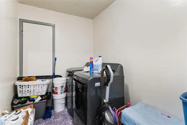 a view of workspace with a baby crib
