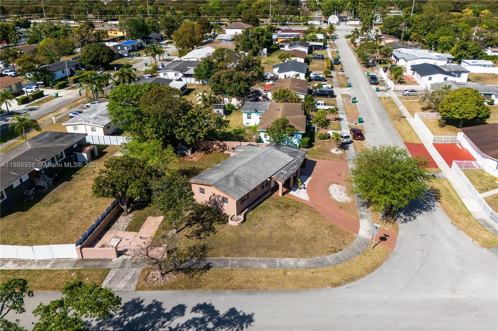 11500 Southwest 142nd Street Miami, FL 33176 - Photo 11 of 35 an aerial view of a house with a swimming pool and outdoor seating