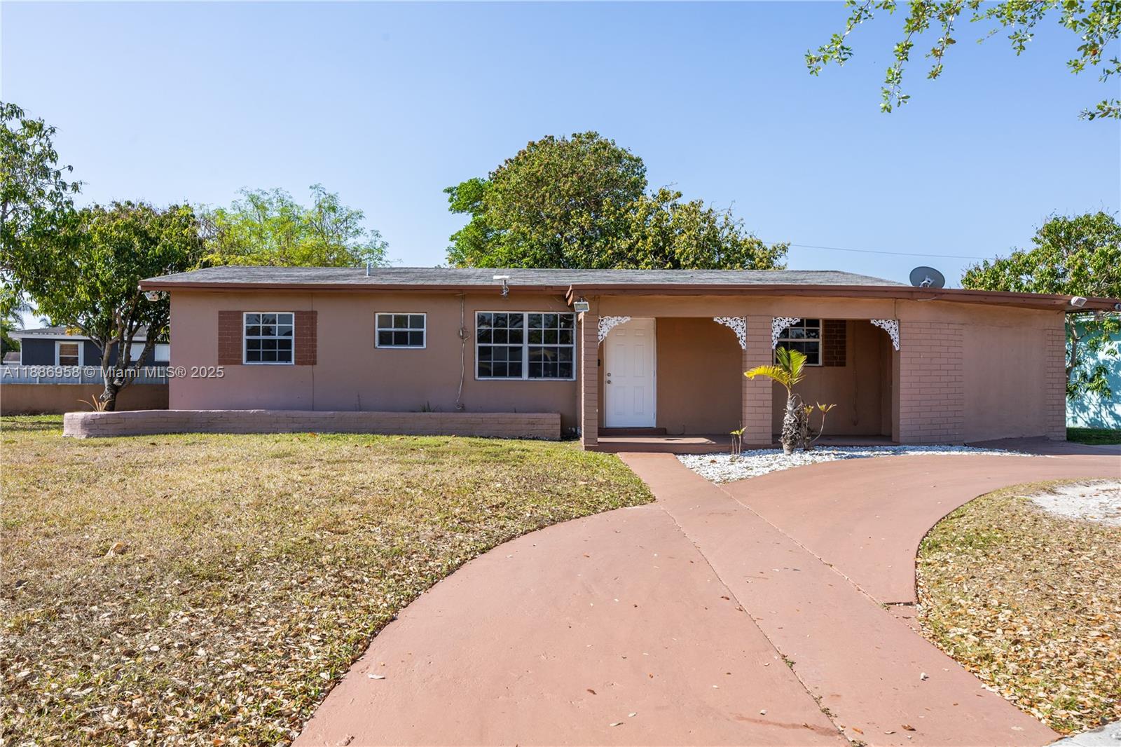 11500 Southwest 142nd Street Miami, FL 33176 - Photo 16 of 35 a front view of house with yard