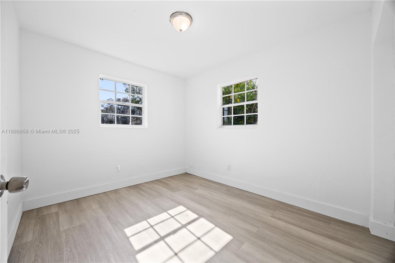 11500 Southwest 142nd Street Miami, FL 33176 - Photo 25 of 35 an empty room with a window