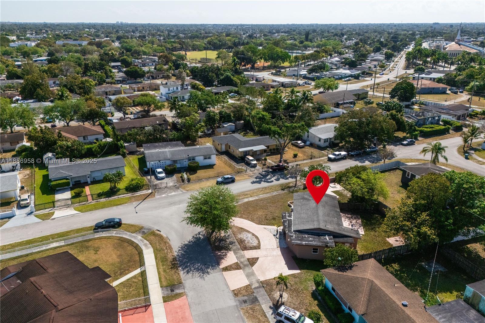 11500 Southwest 142nd Street Miami, FL 33176 - Photo 9 of 35 an aerial view of a swimming pool patio and mountain view