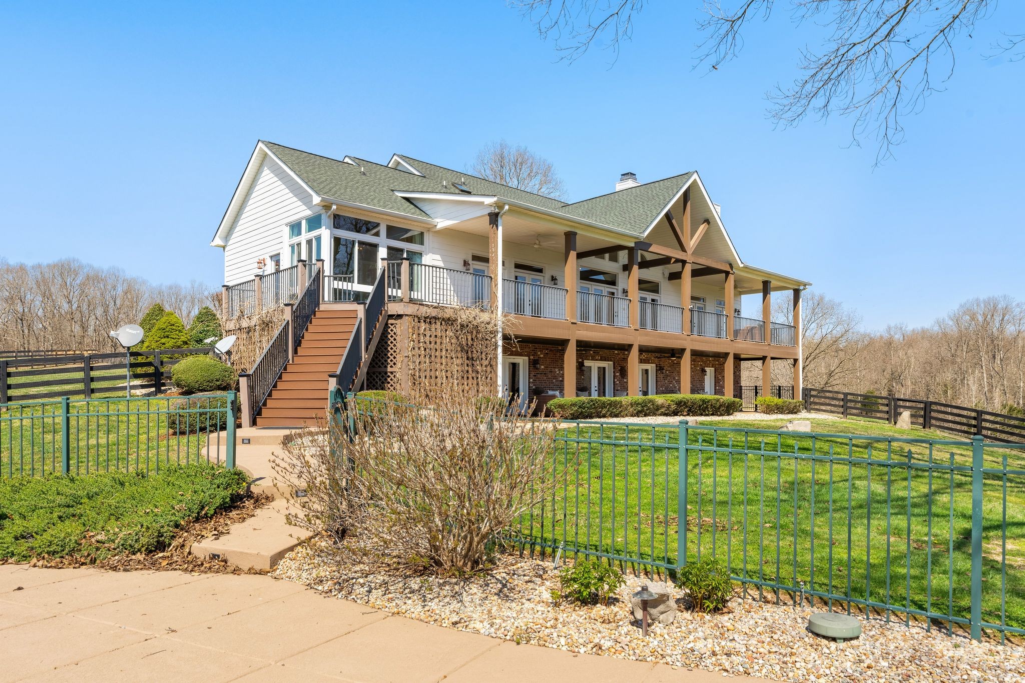 7200 Kingston Road Fairview, TN 37062 - Photo 41 of 68 a front view of a house with a garden