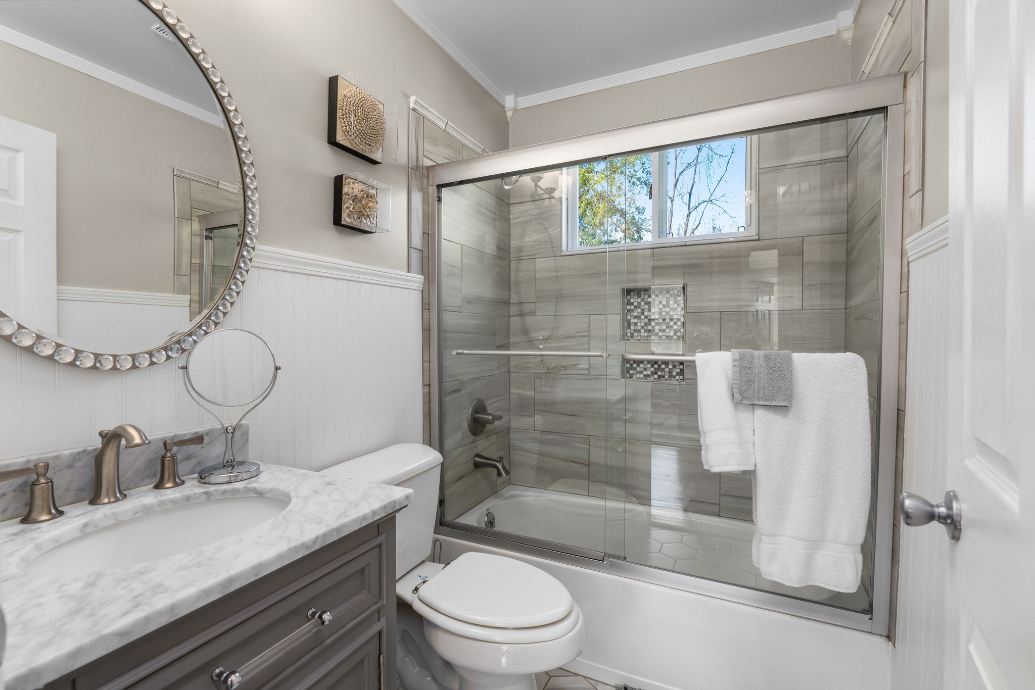 7200 Kingston Road Fairview, TN 37062 - Photo 53 of 68 a bathroom with a granite countertop sink a toilet a mirror and shower