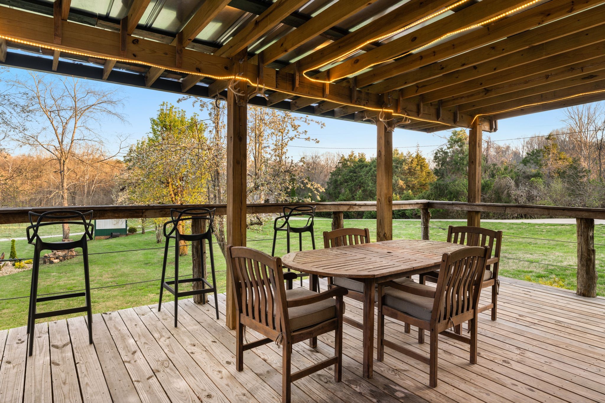 7200 Kingston Road Fairview, TN 37062 - Photo 56 of 68 a view of a deck with wooden floor and outdoor seating