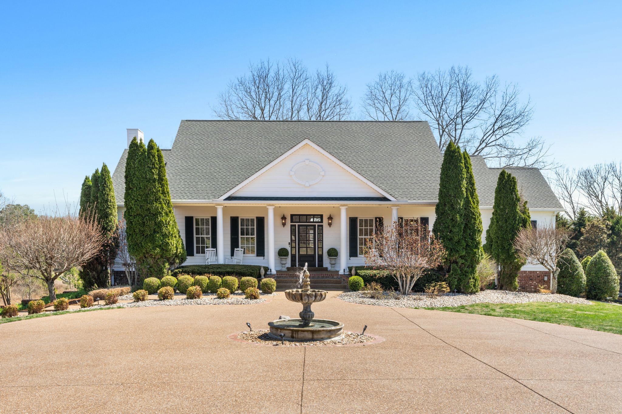 7200 Kingston Road Fairview, TN 37062 - Photo 6 of 68 a front view of house with yard slide and outdoor seating