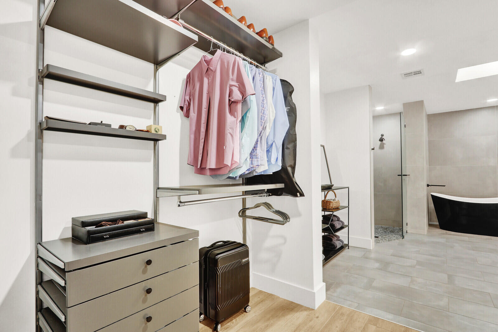 246 Ridge Road Jupiter, FL 33477 - Photo 20 of 39 a view of walk in closet with clothes and shoes