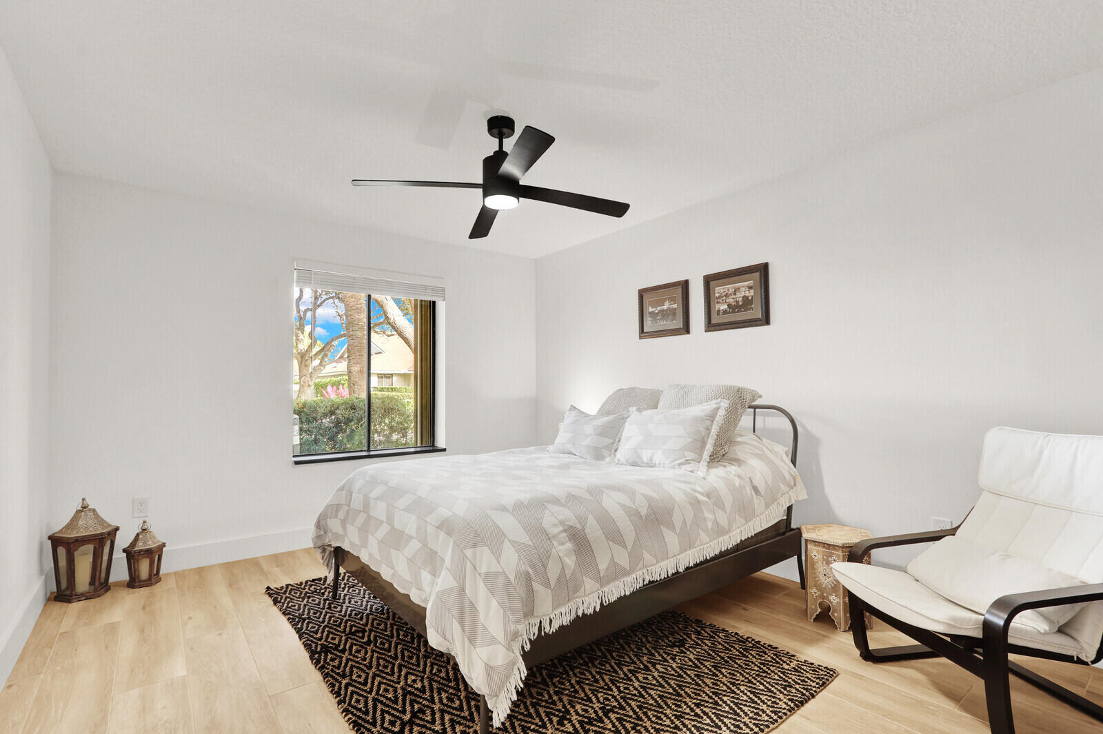 246 Ridge Road Jupiter, FL 33477 - Photo 21 of 39 a bedroom with a bed and a window