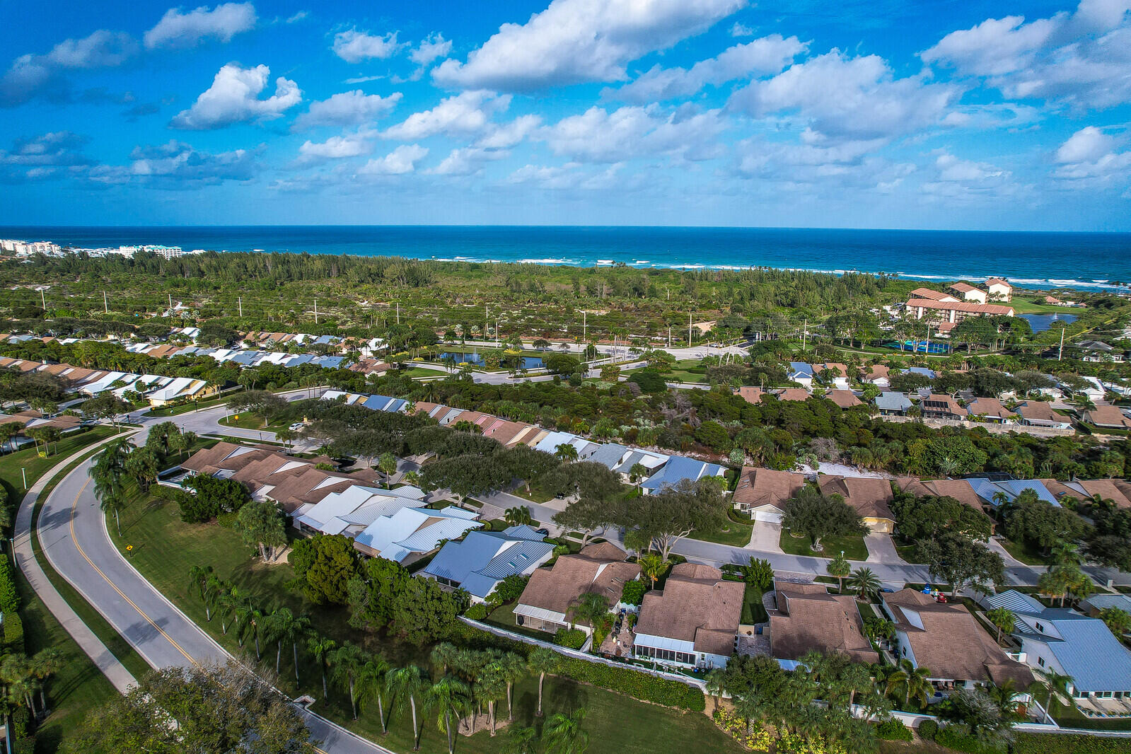 246 Ridge Road Jupiter, FL 33477 - Photo 32 of 39 an aerial view of residential houses with outdoor space and ocean view