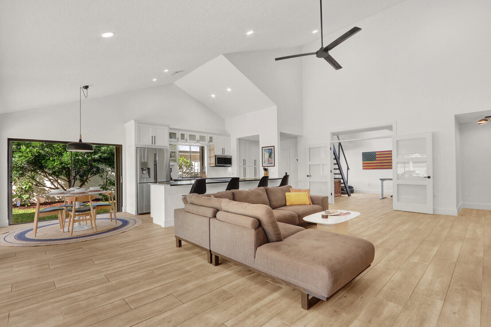 246 Ridge Road Jupiter, FL 33477 - Photo 10 of 39 a living room with furniture and a large window