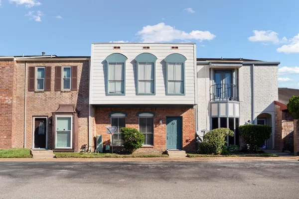 front view of white building