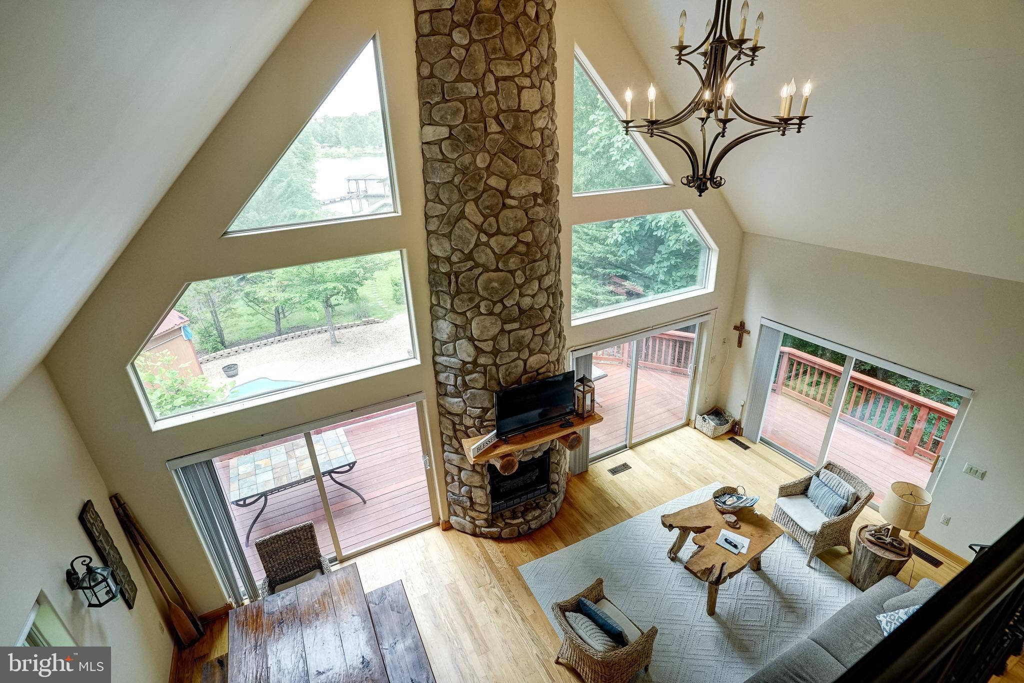 155 Irish Way Bumpass, VA 23024 - Photo 24 of 60 a living room with furniture and a large window