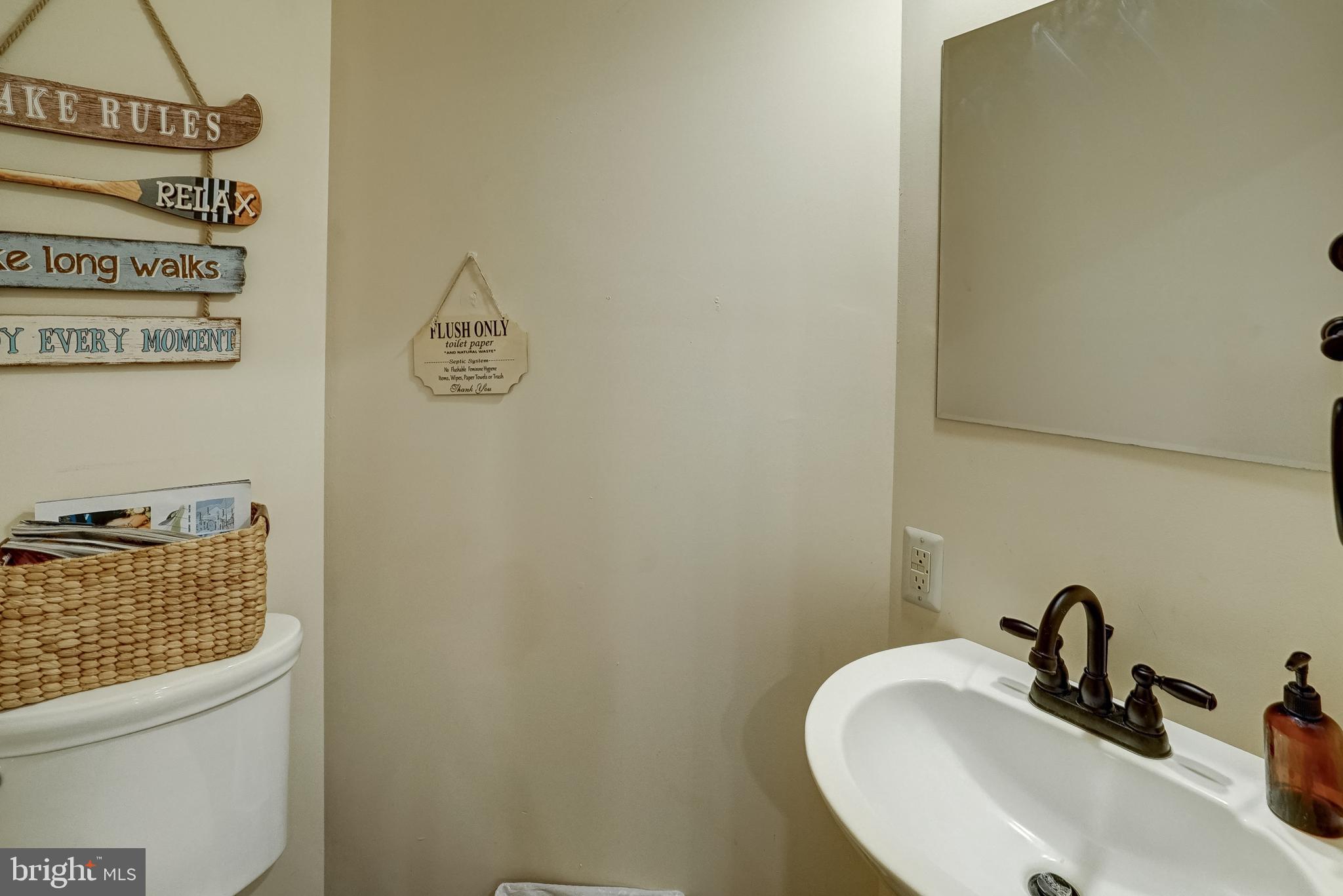 155 Irish Way Bumpass, VA 23024 - Photo 25 of 60 a bathroom with a sink and a mirror