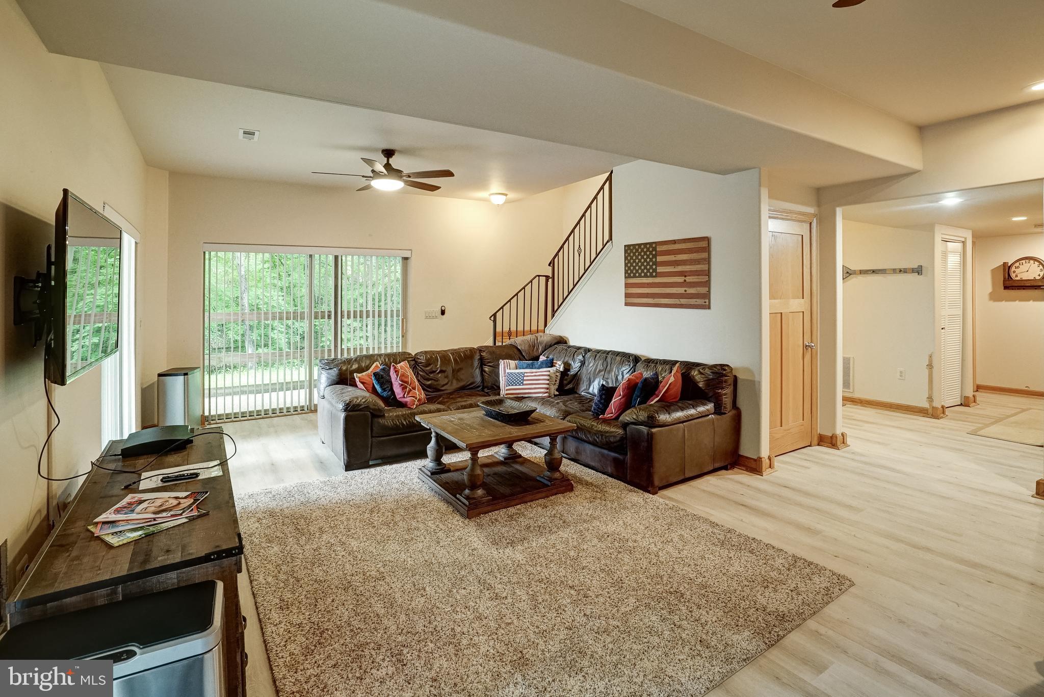 155 Irish Way Bumpass, VA 23024 - Photo 38 of 60 a living room with furniture and a flat screen tv