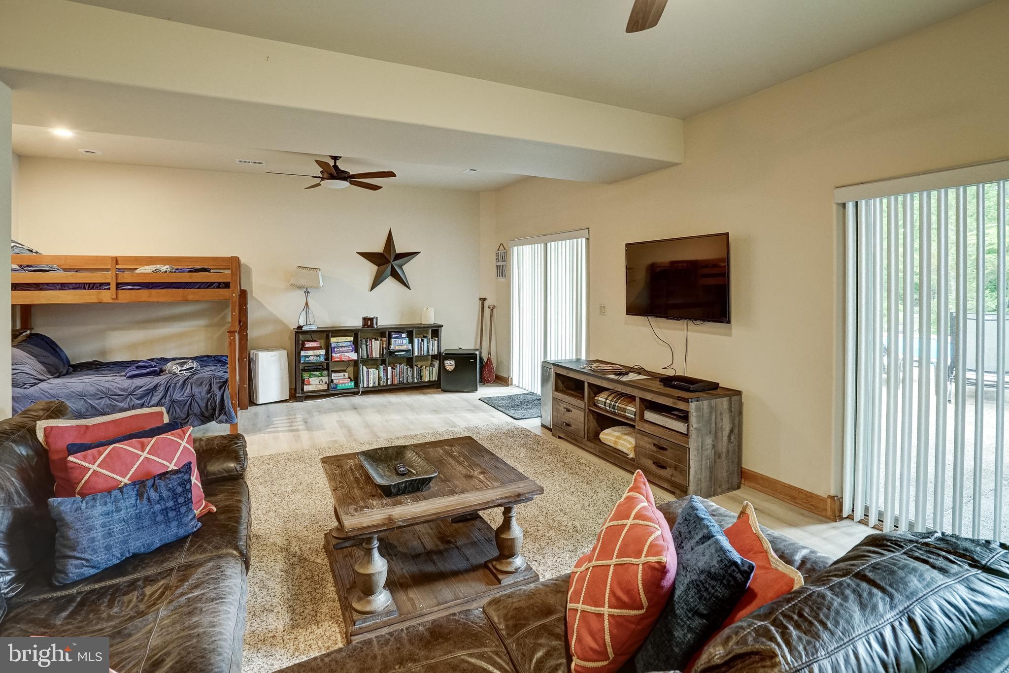 155 Irish Way Bumpass, VA 23024 - Photo 40 of 60 a bedroom with furniture and a flat screen tv