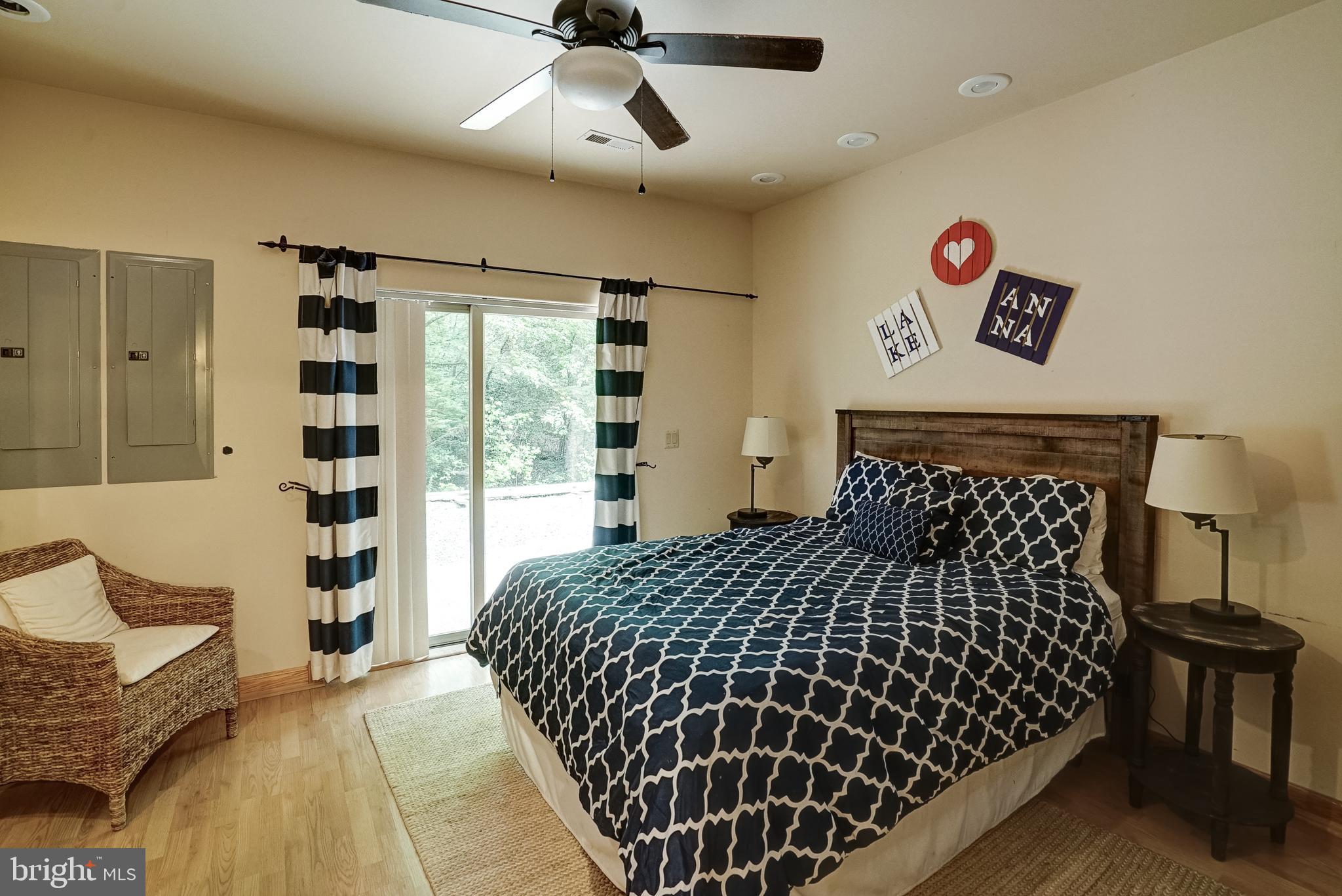155 Irish Way Bumpass, VA 23024 - Photo 43 of 60 a bedroom with a large bed and a window