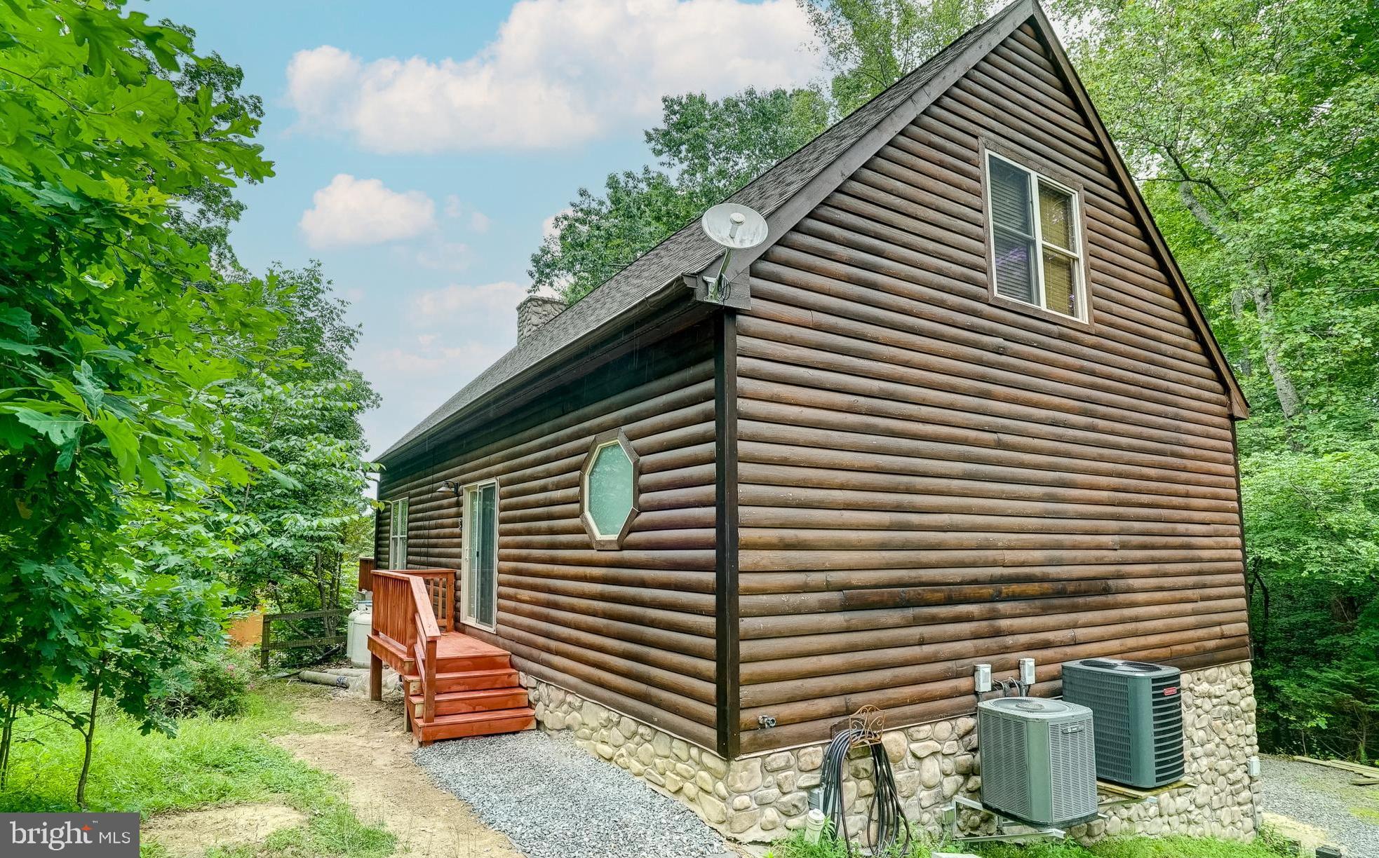155 Irish Way Bumpass, VA 23024 - Photo 51 of 60 a front view of a house with garden