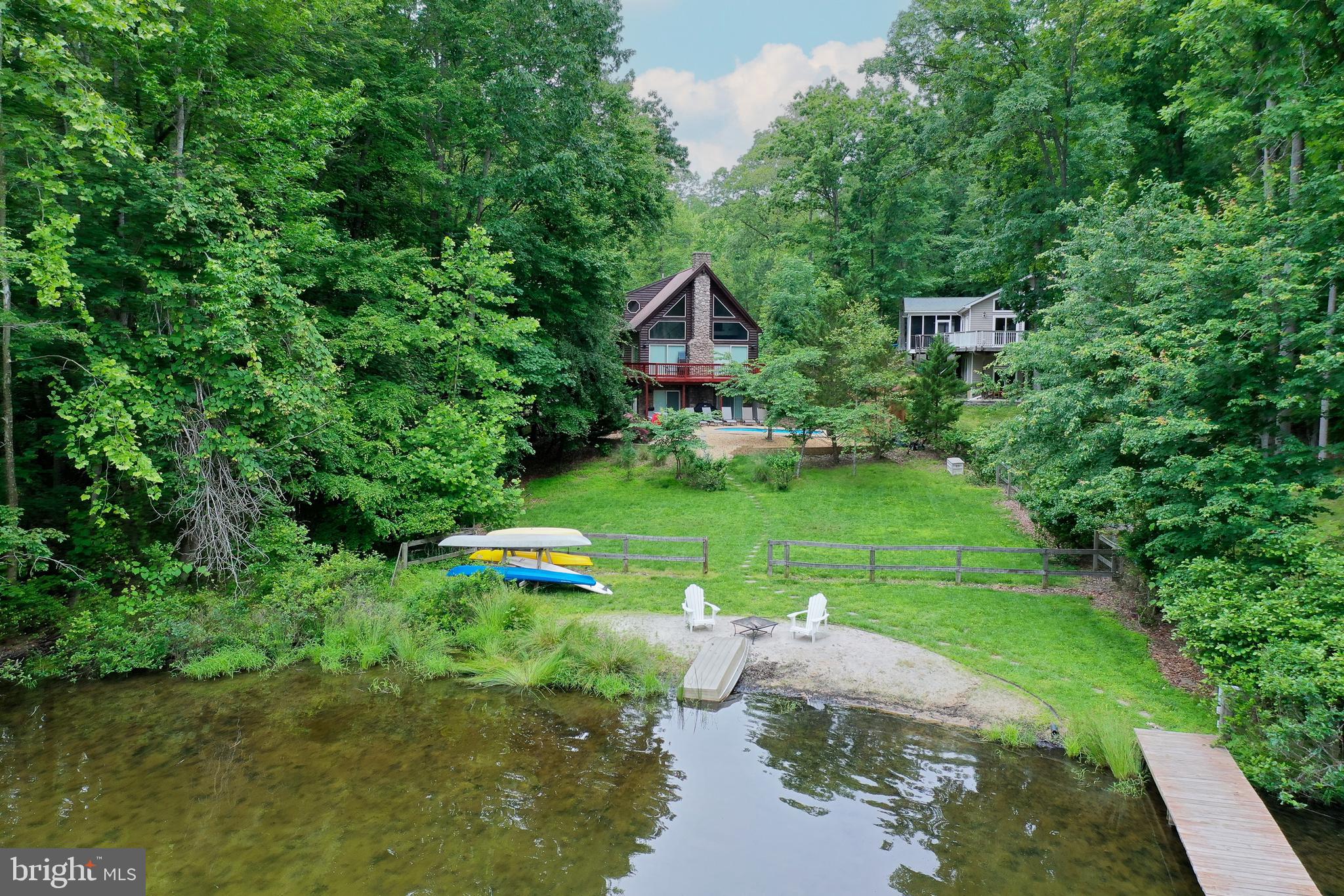 155 Irish Way Bumpass, VA 23024 - Photo 57 of 60 a view of a garden with a lake
