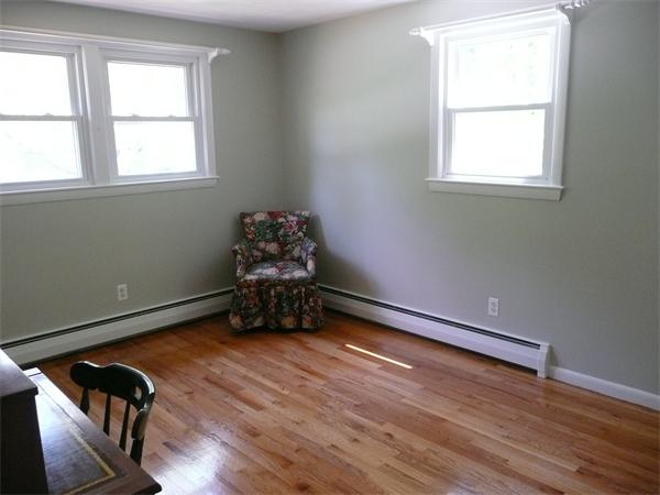 13 Montbatten Road Billerica, MA 01821 - Photo 12 of 18 an empty room with wooden floor and windows