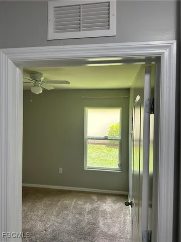 a bathroom with a shower a toilet and a shower