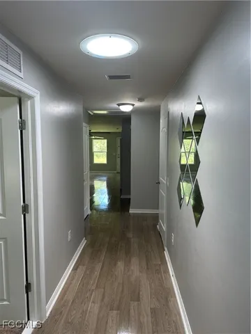 a view of small space with racks on the wall