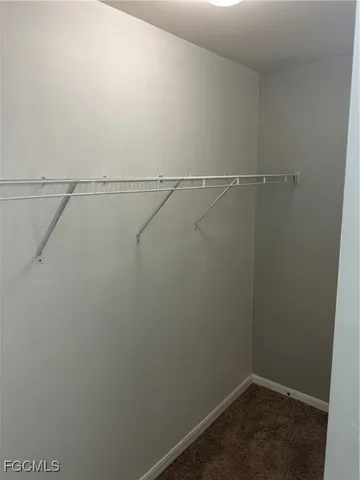 a bathroom with a sink and vanity