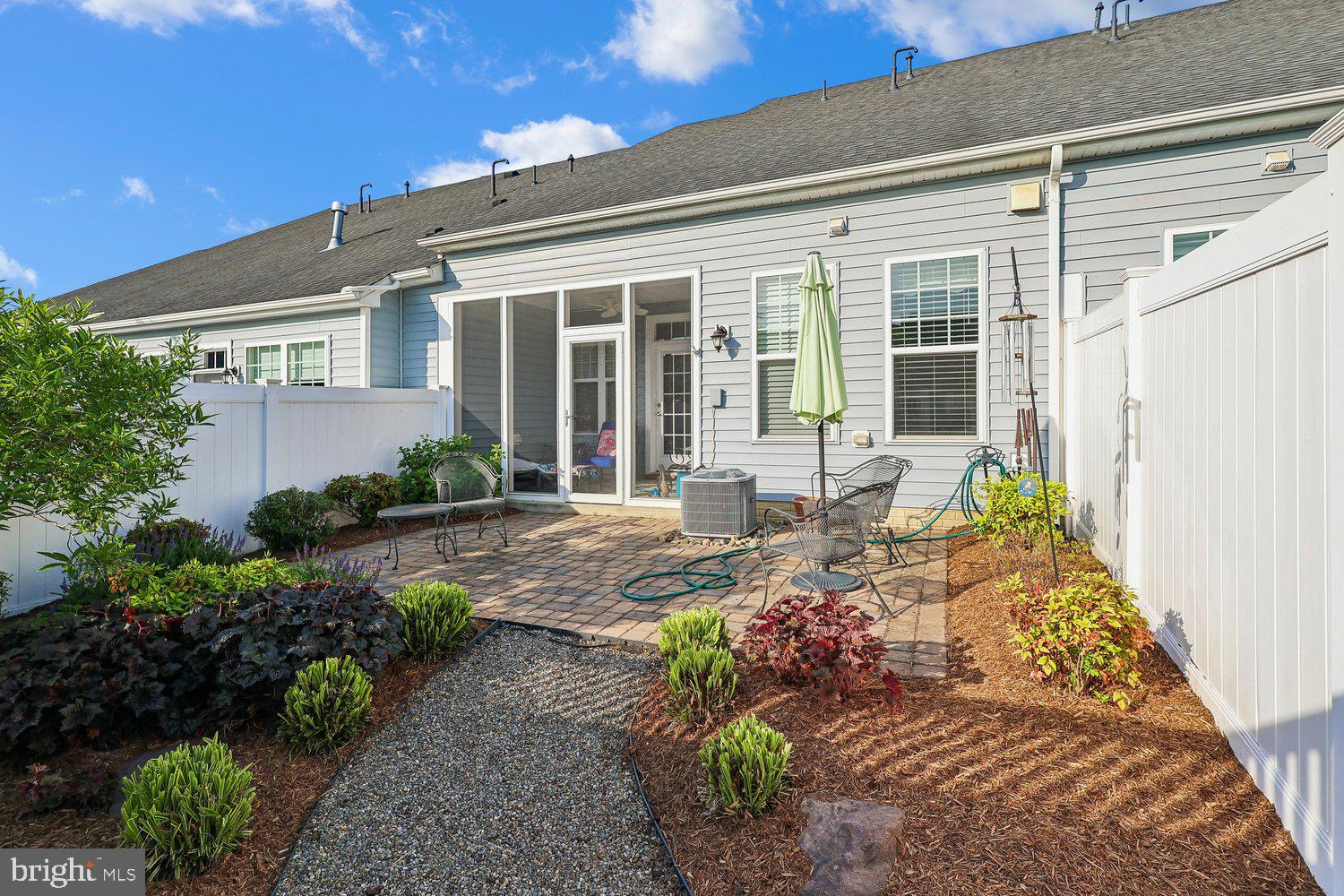 3068 Spring Peeper Court Odenton, MD 21113 - Photo 13 of 29 a front view of a house with garden