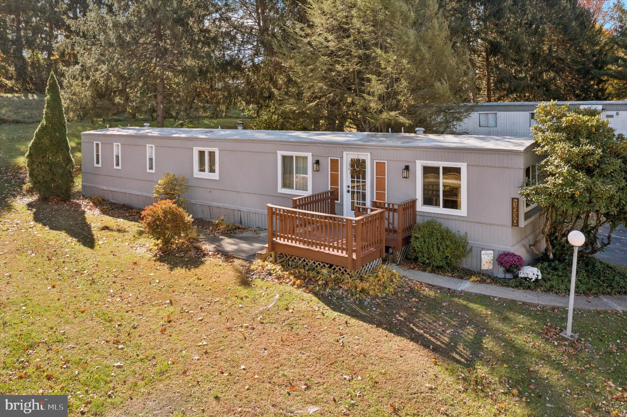 1530 Rome Road West Chester, PA 19380 - Photo 11 of 27 a front view of a house with a yard and garage