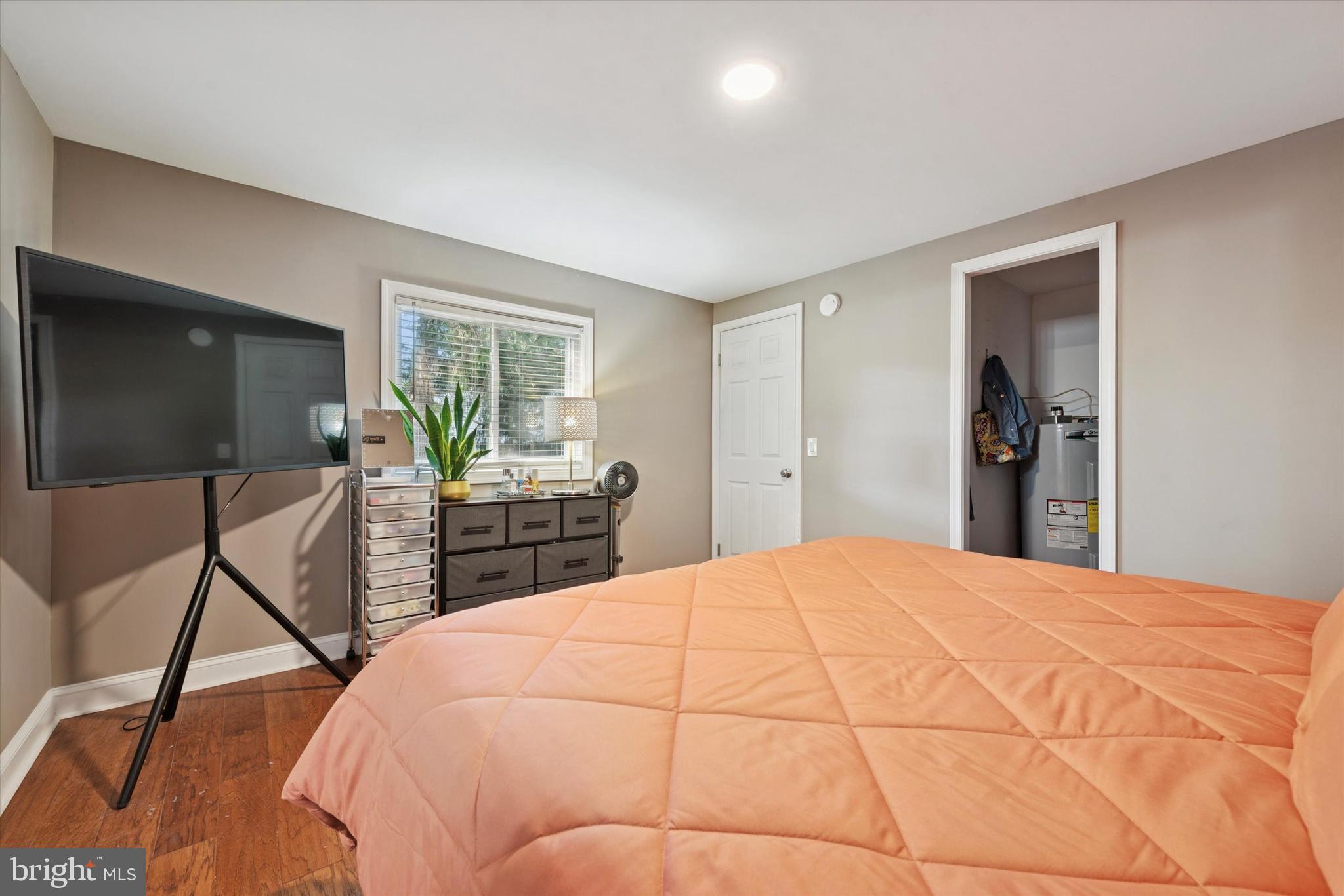 1530 Rome Road West Chester, PA 19380 - Photo 16 of 27 a bedroom with a bed and a flat screen tv