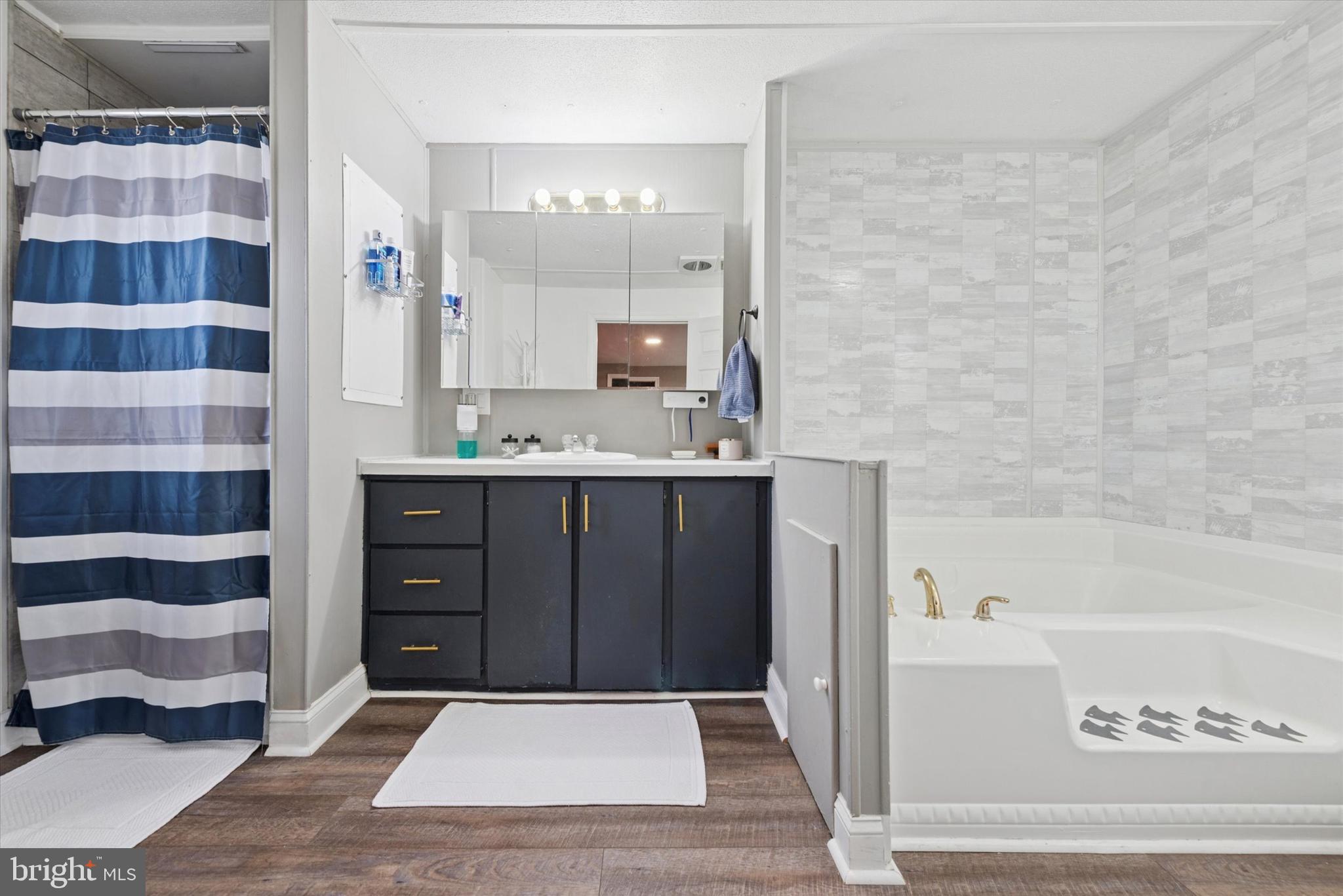 1530 Rome Road West Chester, PA 19380 - Photo 19 of 27 a bathroom with a tub shower and sink
