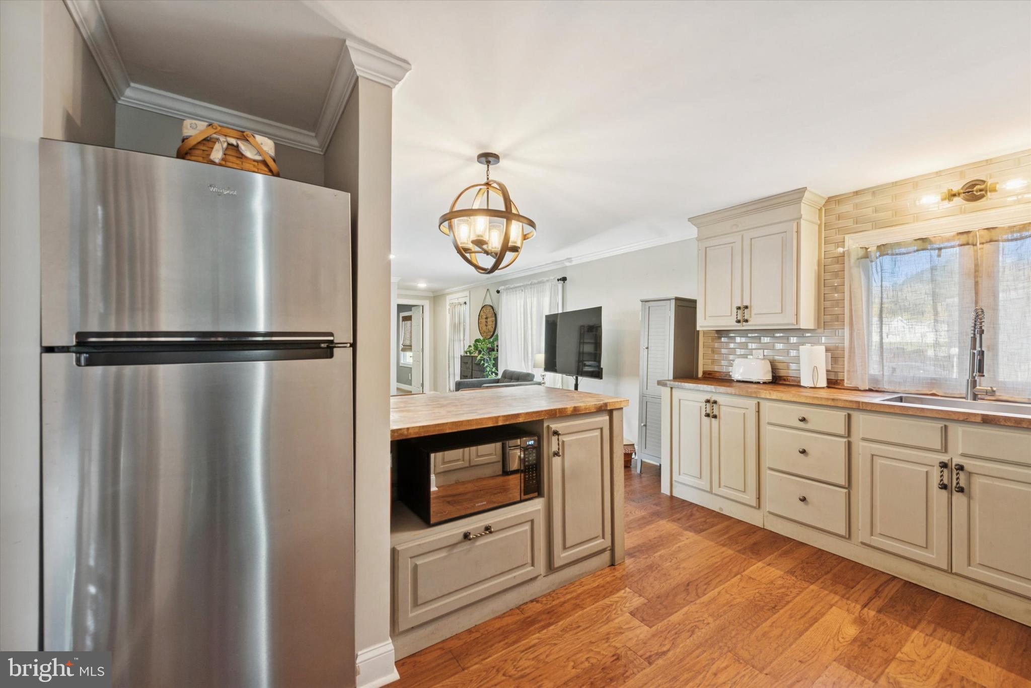 1530 Rome Road West Chester, PA 19380 - Photo 8 of 27 a kitchen with stainless steel appliances granite countertop a refrigerator a stove and a sink