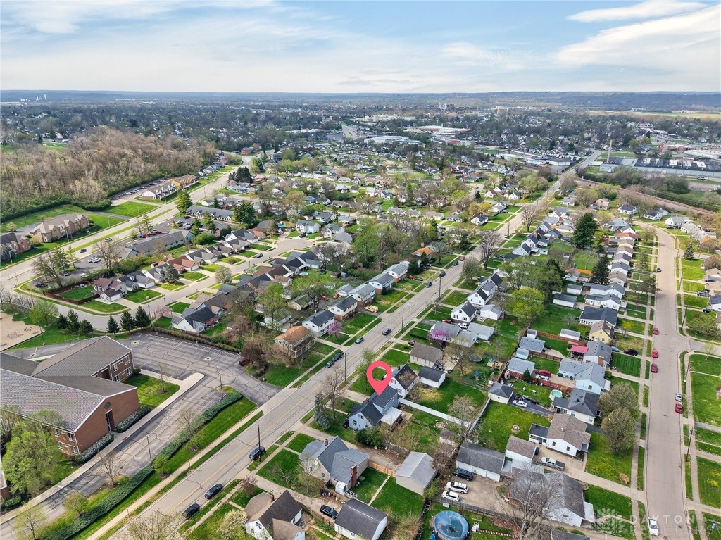 3301 Wildwood Road Middletown, OH 45042 - Photo 64 of 68 An aerial perspective reveals a vibrant neighborhood with residential homes nestled amidst lush greenery.