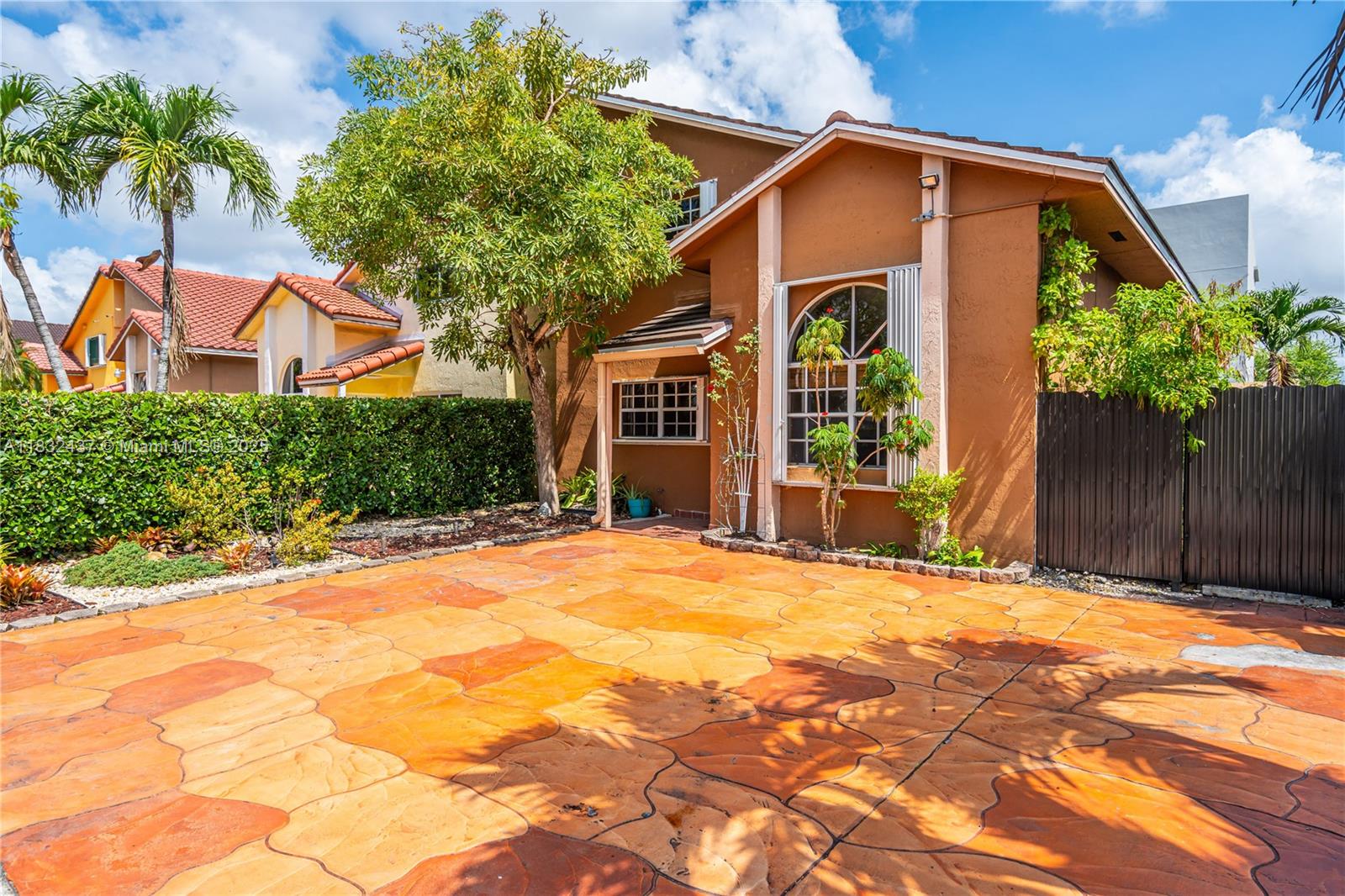 7811 Southwest 9th Terrace Miami, FL 33144 - Photo 5 of 27 a front view of a house with a yard