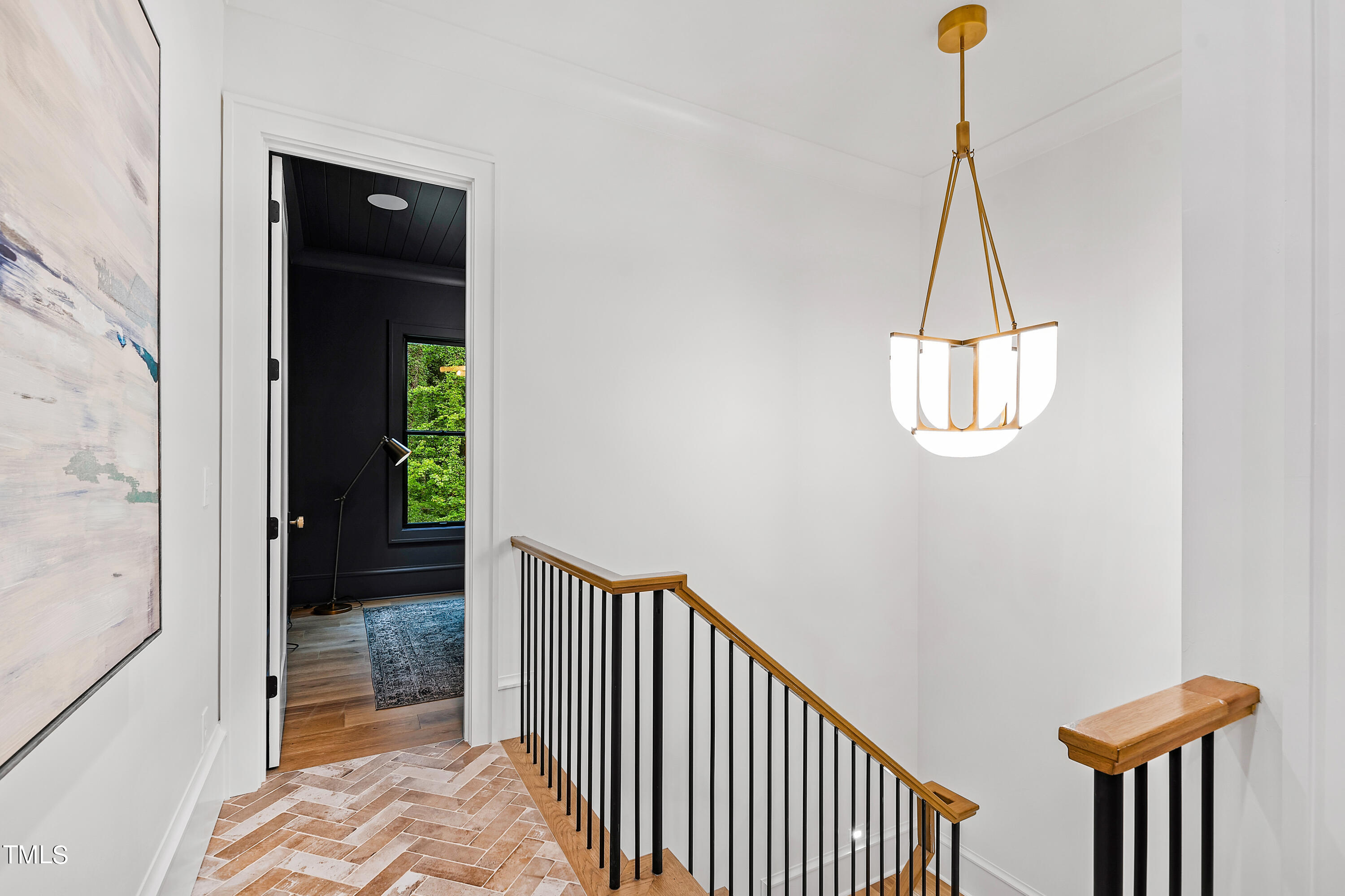 1104 Manchester Drive Raleigh, NC 27609 - Photo 14 of 52 a view of a hallway with windows