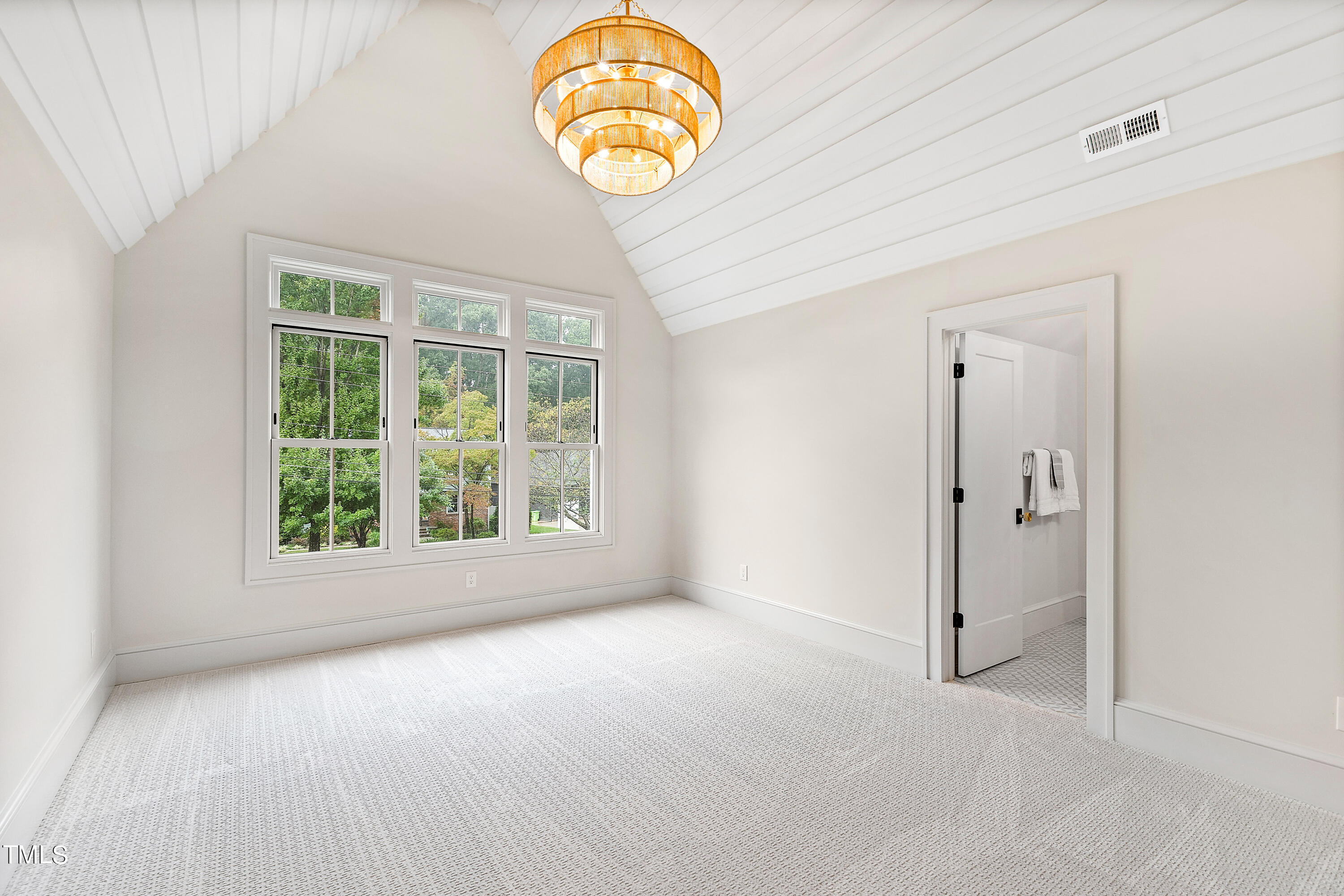 1104 Manchester Drive Raleigh, NC 27609 - Photo 23 of 52 a view of an empty room with a window