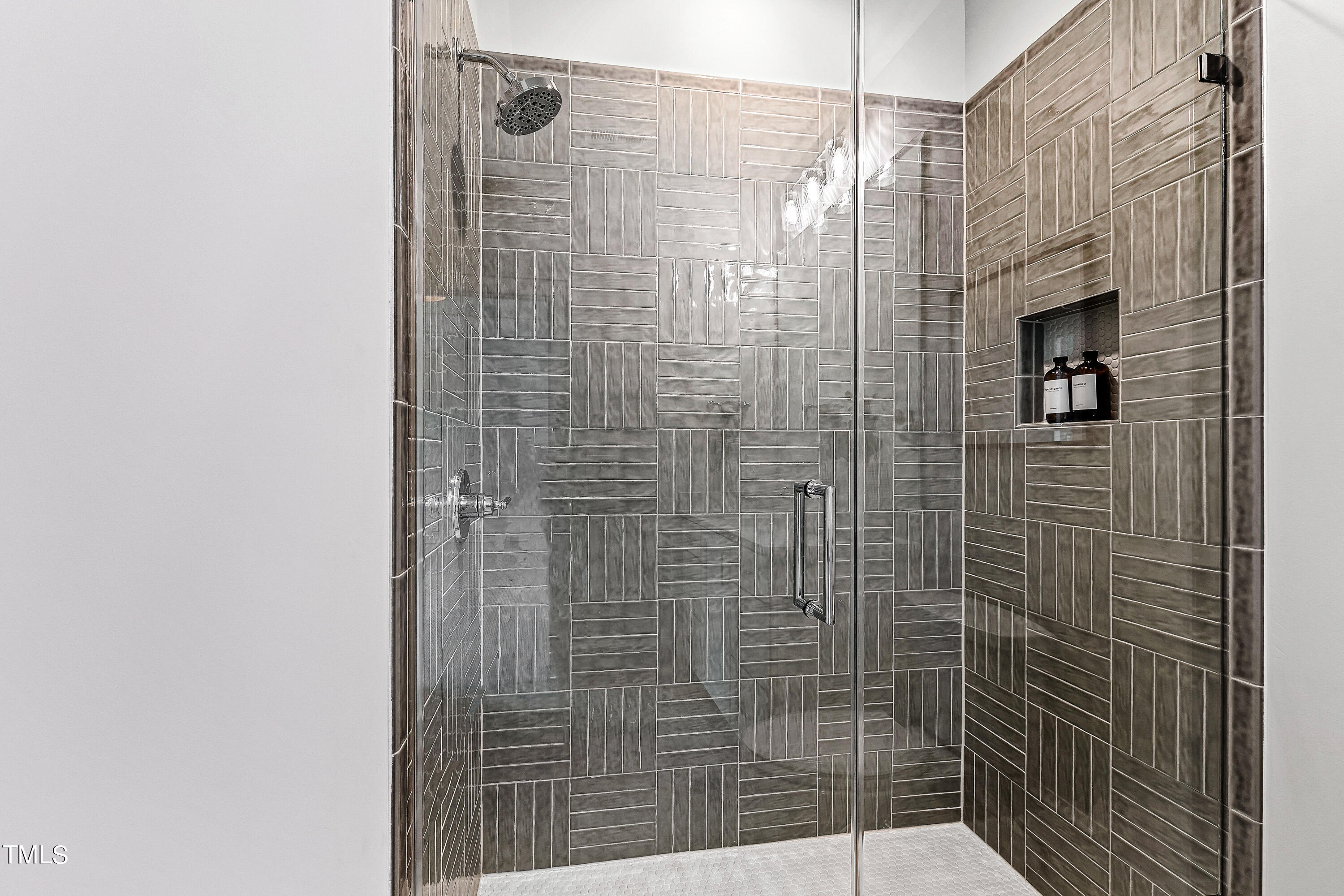 1104 Manchester Drive Raleigh, NC 27609 - Photo 25 of 52 a bathroom with a shower