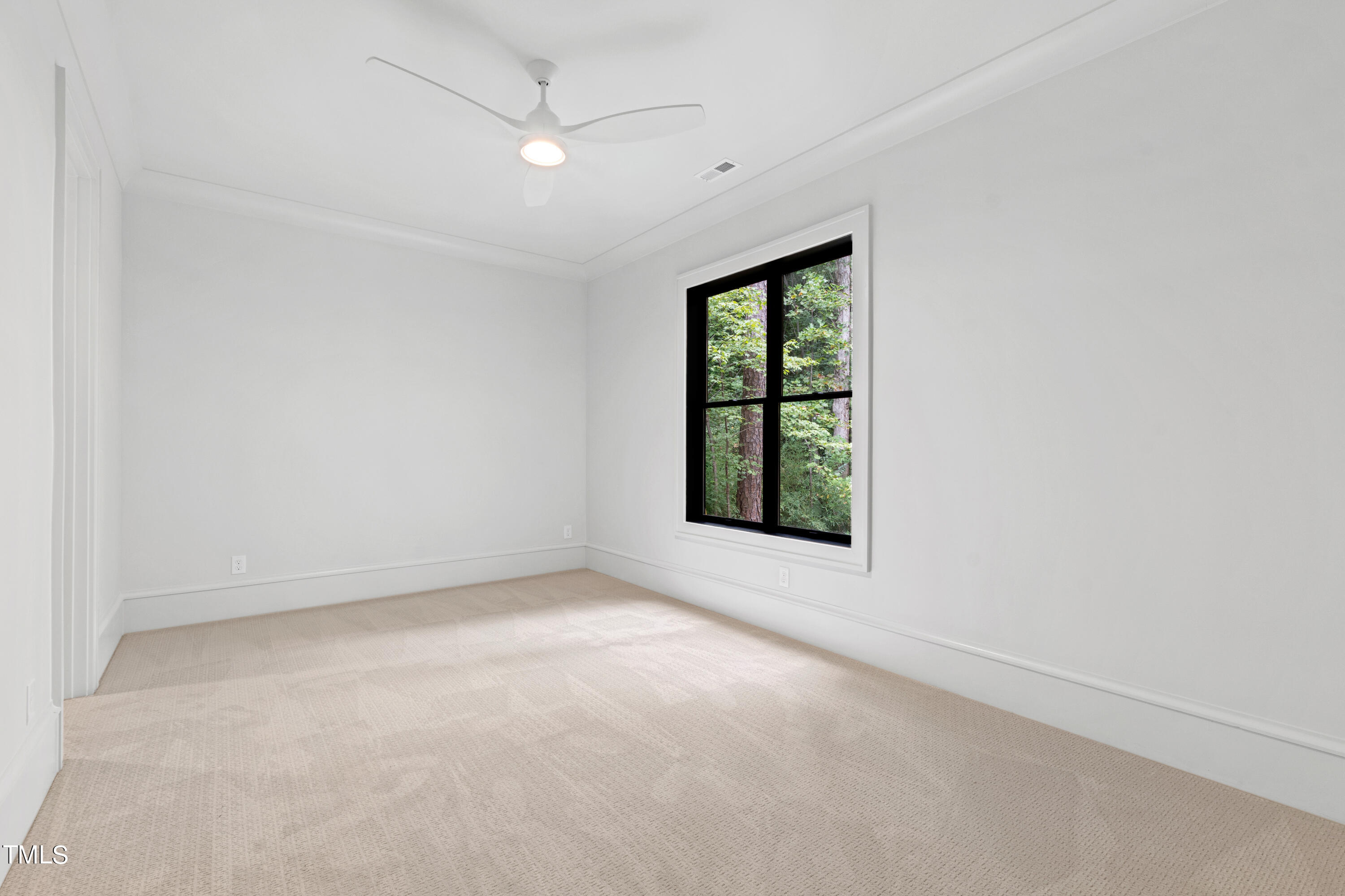1104 Manchester Drive Raleigh, NC 27609 - Photo 30 of 52 an empty room with windows and closet