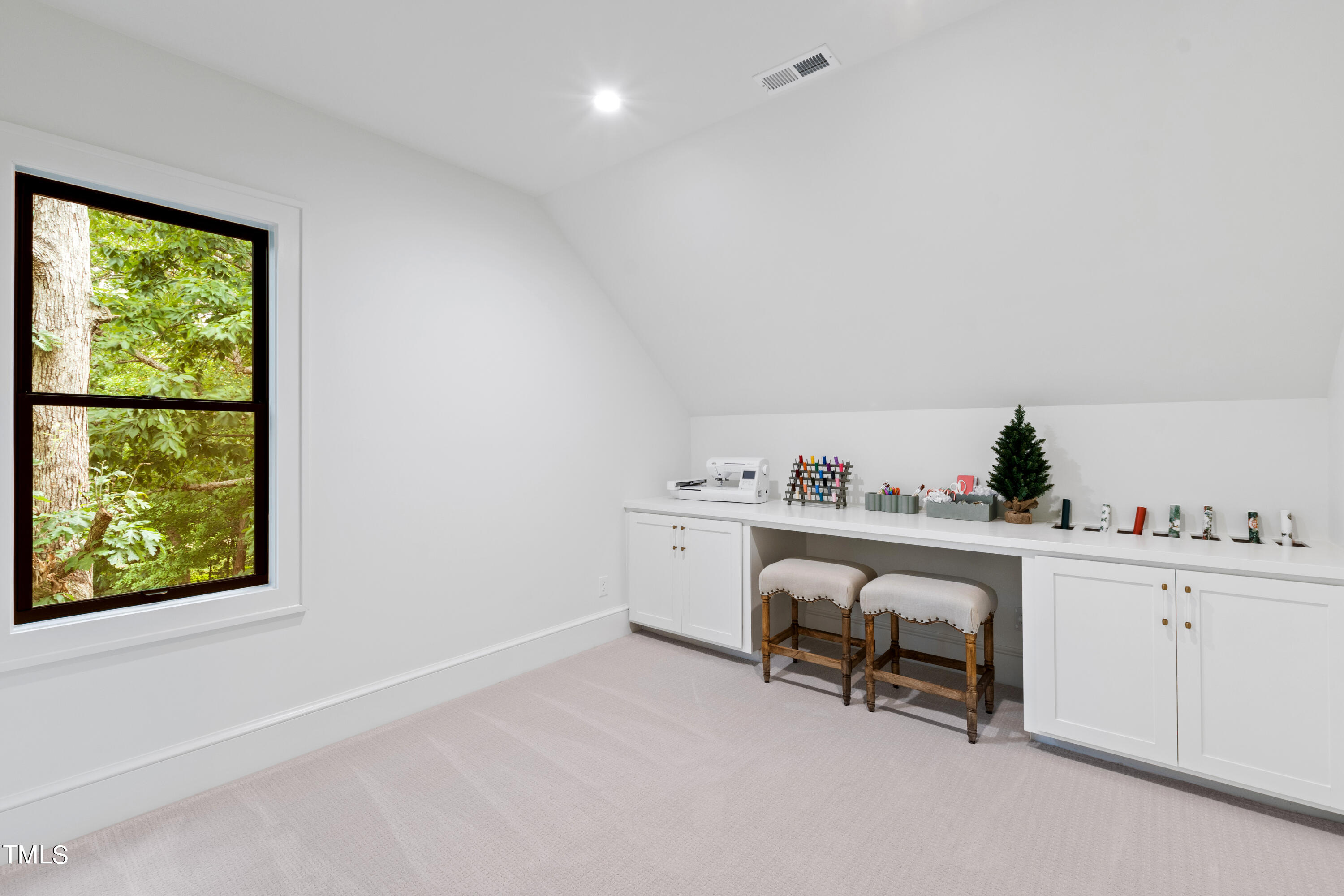 1104 Manchester Drive Raleigh, NC 27609 - Photo 36 of 52 a view of workspace with a window