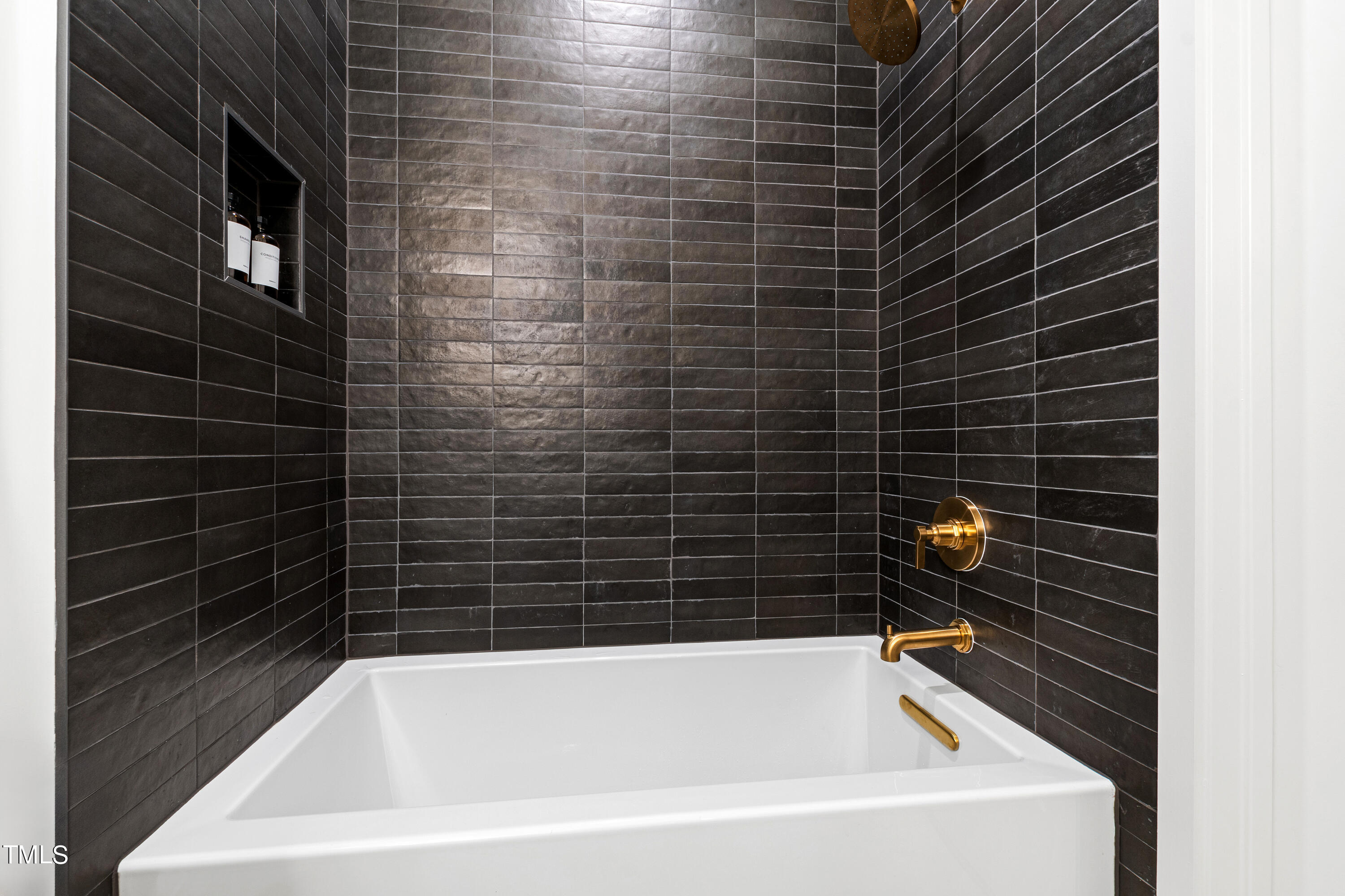 1104 Manchester Drive Raleigh, NC 27609 - Photo 51 of 52 a bathroom with a bathtub
