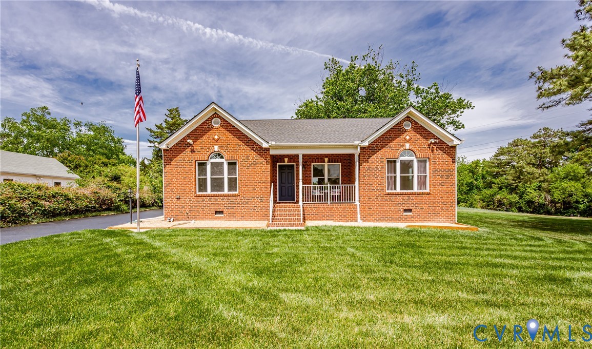 2018 Valentine Road Henrico, VA 23228 - Photo 3 of 65 a front view of a house with a yard