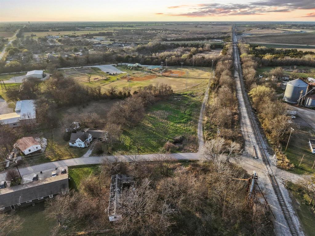 120 Holmes Street, Unit LOT 2 Trenton, TX 75490 - Photo 5 of 21 a view of a lake