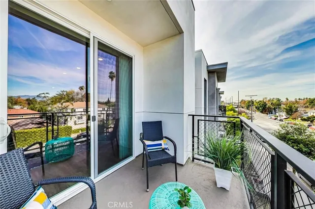 a view of parking garage with cars