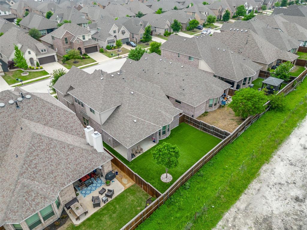 3044 Bold Ruler Road Celina, TX 75009 - Photo 27 of 36 an aerial view of a house