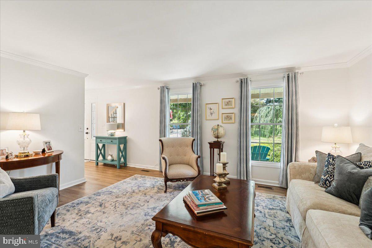 1377 Rock Chapel Road Herndon, VA 20170 - Photo 17 of 65 a living room with furniture or couch and a large window