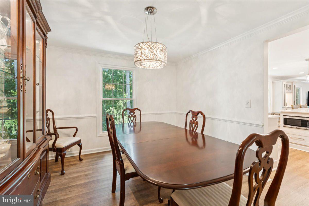 1377 Rock Chapel Road Herndon, VA 20170 - Photo 25 of 65 a view of a dining room with furniture window and outside view