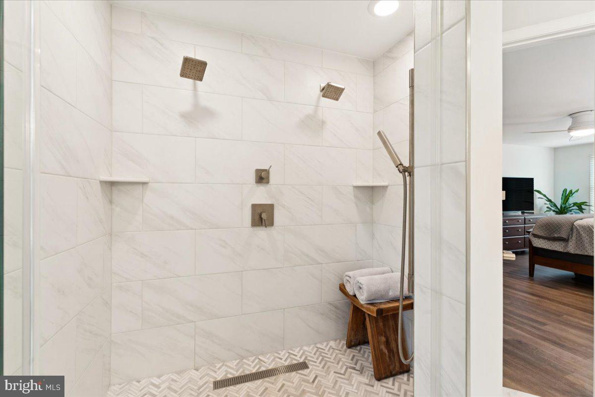 1377 Rock Chapel Road Herndon, VA 20170 - Photo 31 of 65 a bathroom with a sink and a shower