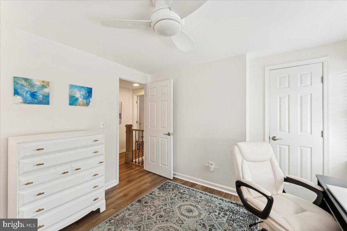 1377 Rock Chapel Road Herndon, VA 20170 - Photo 34 of 65 a view of a room with furniture and wooden floor